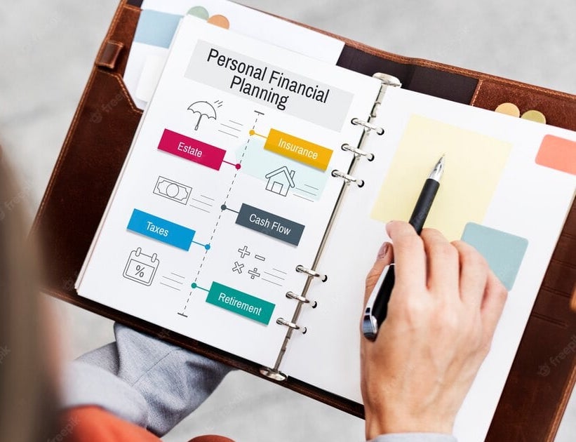 Open planner showing personal financial planning diagram